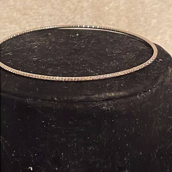 7.5” stackable polished silver tone bangle bracelet w/32 prong set crystals - Picture 5 of 12